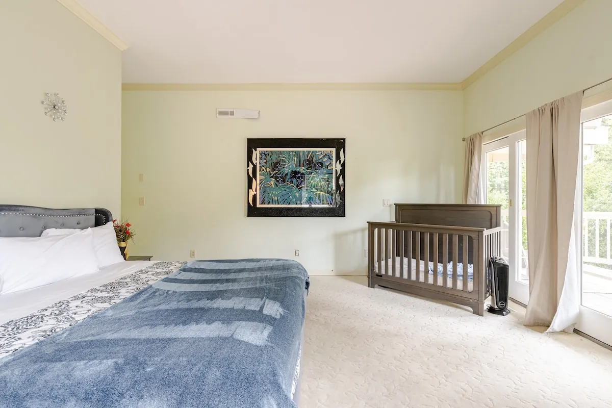 Bedroom with floral bedding and natural light