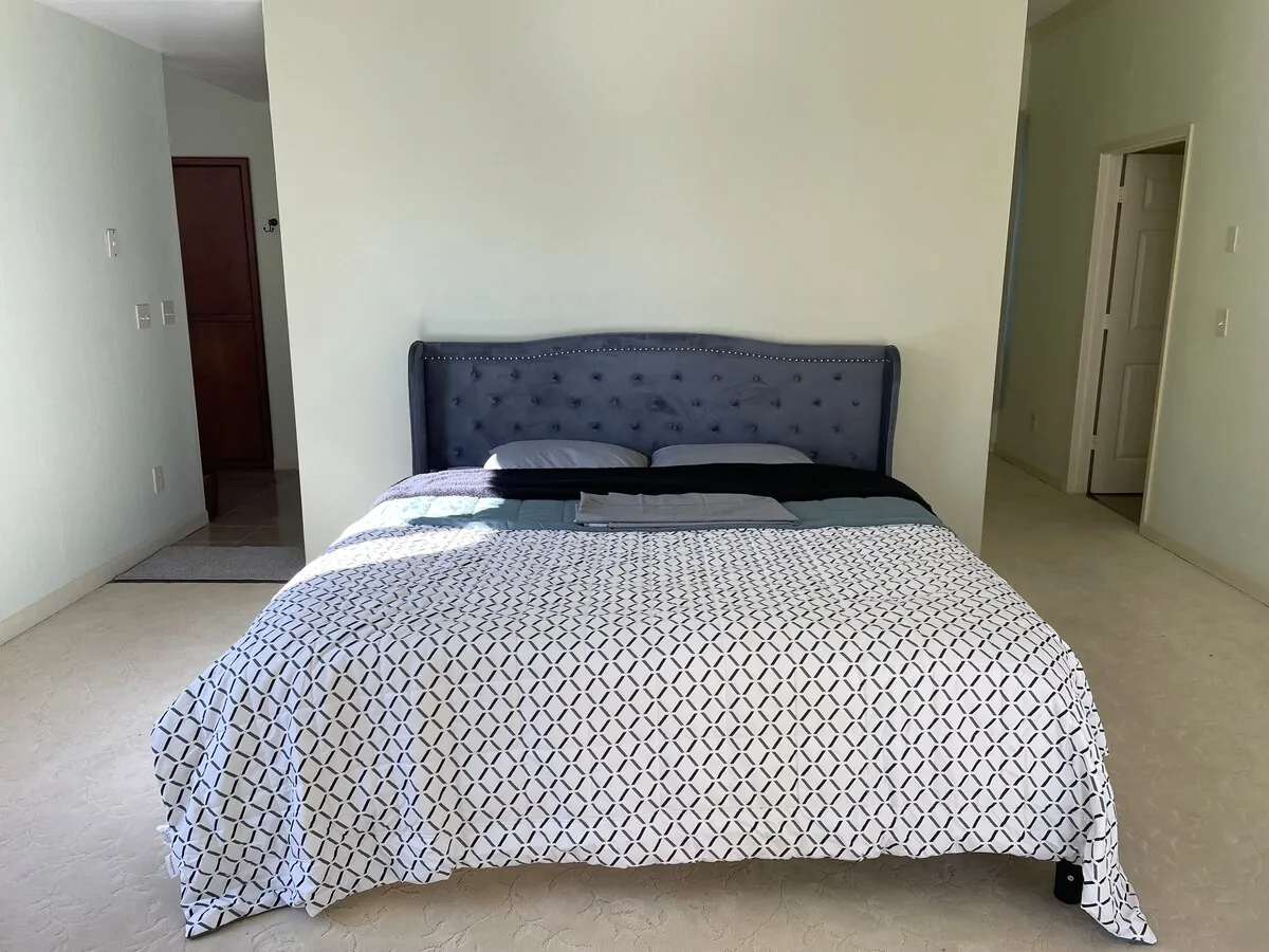 Bedroom with king bed and minimalist style